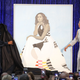 Former U.S. first lady Michelle Obama (L) and artist Amy Sherald unveil her portrait during a ceremony at the Smithsonian’s National Portrait Gallery, on February 12, 2018 in Washington, DC. The portraits were commissioned by the Gallery, for Kehinde Wiley to create President Obama’s portrait, and Amy Sherald that of Michelle Obama. ( Mark Wilson/Getty Images)